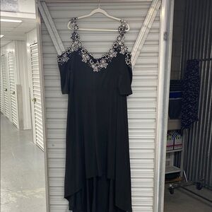 Elegant Black Dress with Floral Embellishments